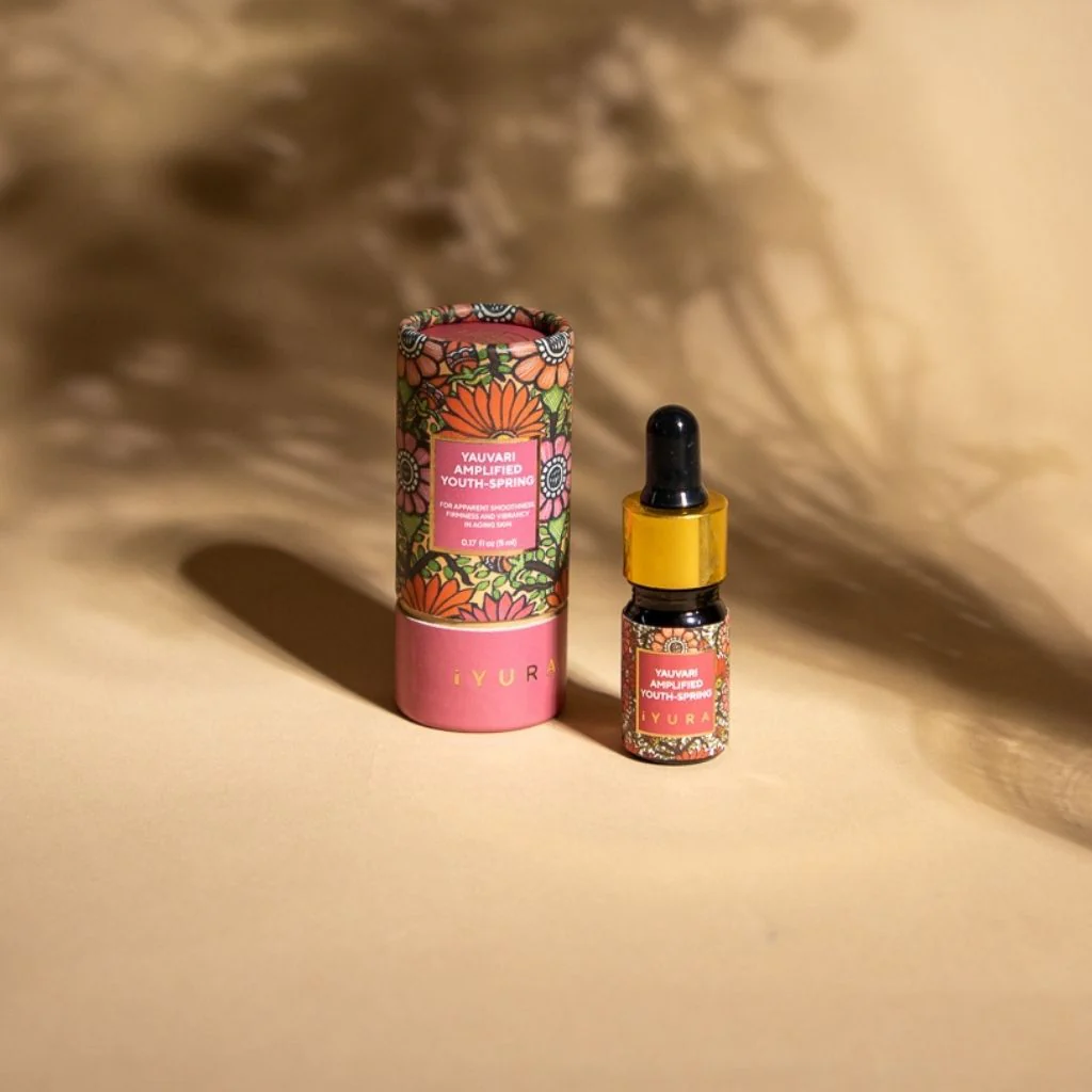 This Mini Yauvari Amplified Youth Spring is a potent, travel-sized moisturizer designed to "snap" the skin back to a youthful state. Using a base of Black Gram and botanical oils, it provides an immediate plumping effect, smoothing the appearance of fine lines and restoring a bouncy, firm texture to the face and neck.